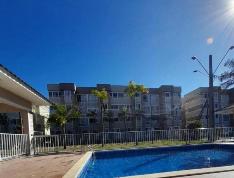 Bazén v ubytování Apartamento grande Florianópolis próximo arena opus nebo v jeho okolí