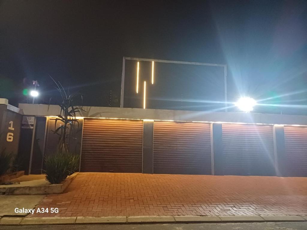 a garage at night with lights on top of it at 16 on Ryde in Durban