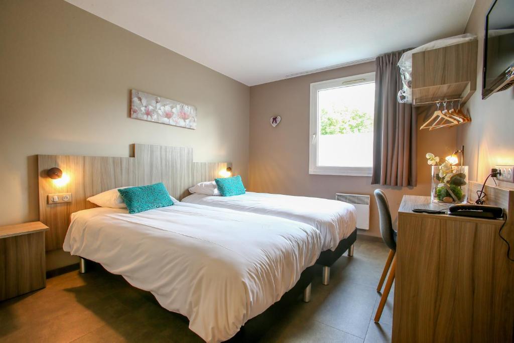 Postel nebo postele na pokoji v ubytování Hotel Ecluse 34