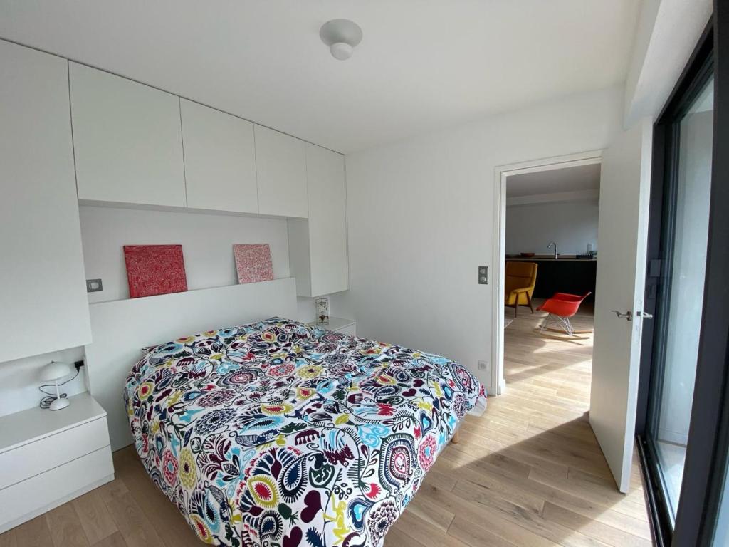 Posteľ alebo postele v izbe v ubytovaní Au Nom du Zen 3 pièces avec terrasse cœur Deauville
