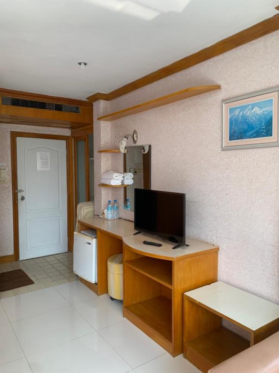 TV a/nebo společenská místnost v ubytování N.P.Place Resort&Hotel
