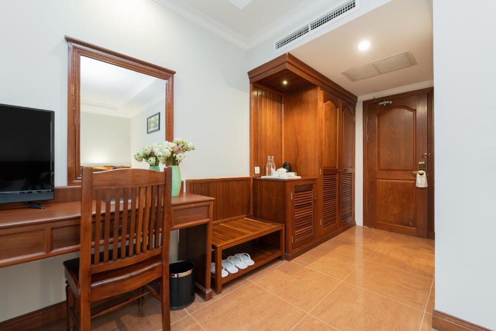 TV a/nebo společenská místnost v ubytování Monoreach Angkor Hotel