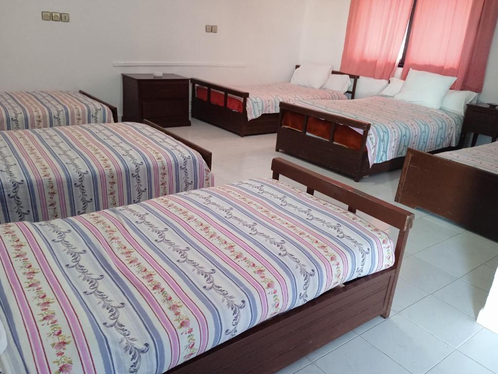 Postel nebo postele na pokoji v ubytování Hôtel Briech & Spa