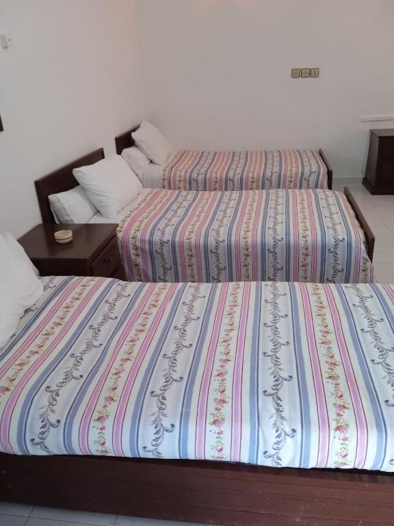 Postel nebo postele na pokoji v ubytování Hôtel Briech & Spa