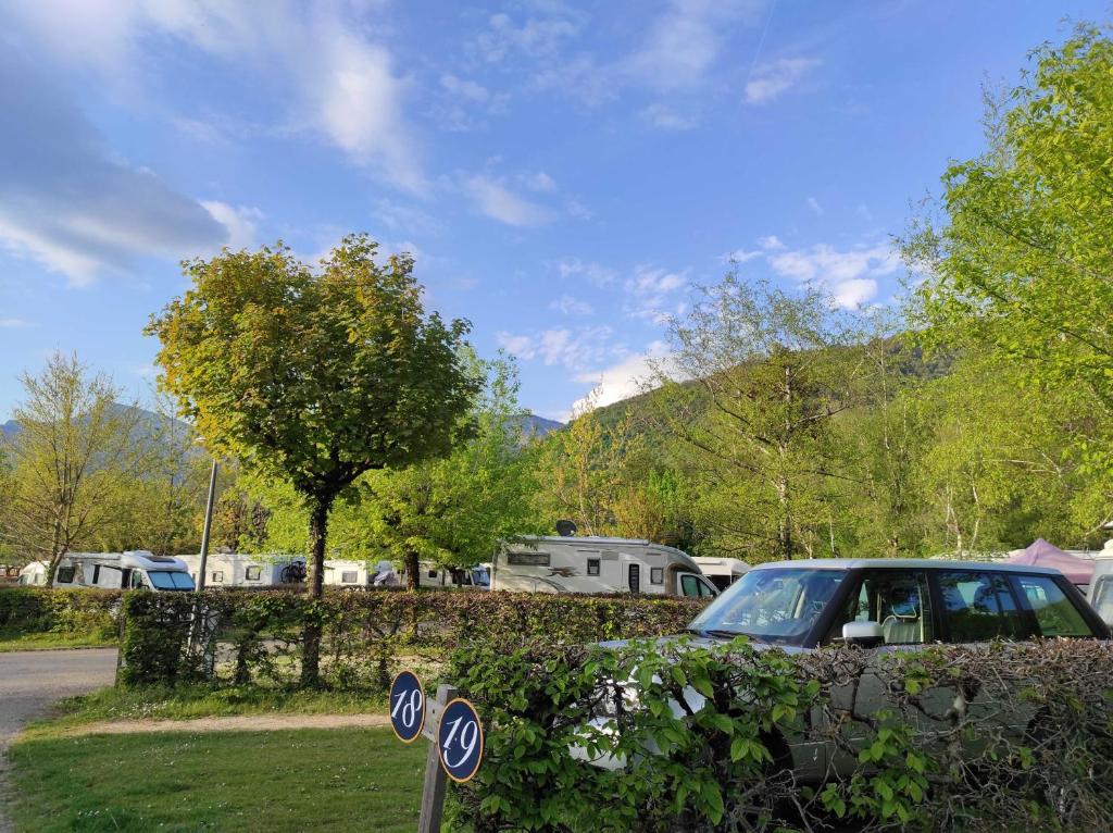 a car parked on the side of a road at Family&#39;s Camping Le Savoy in Challes-les-Eaux