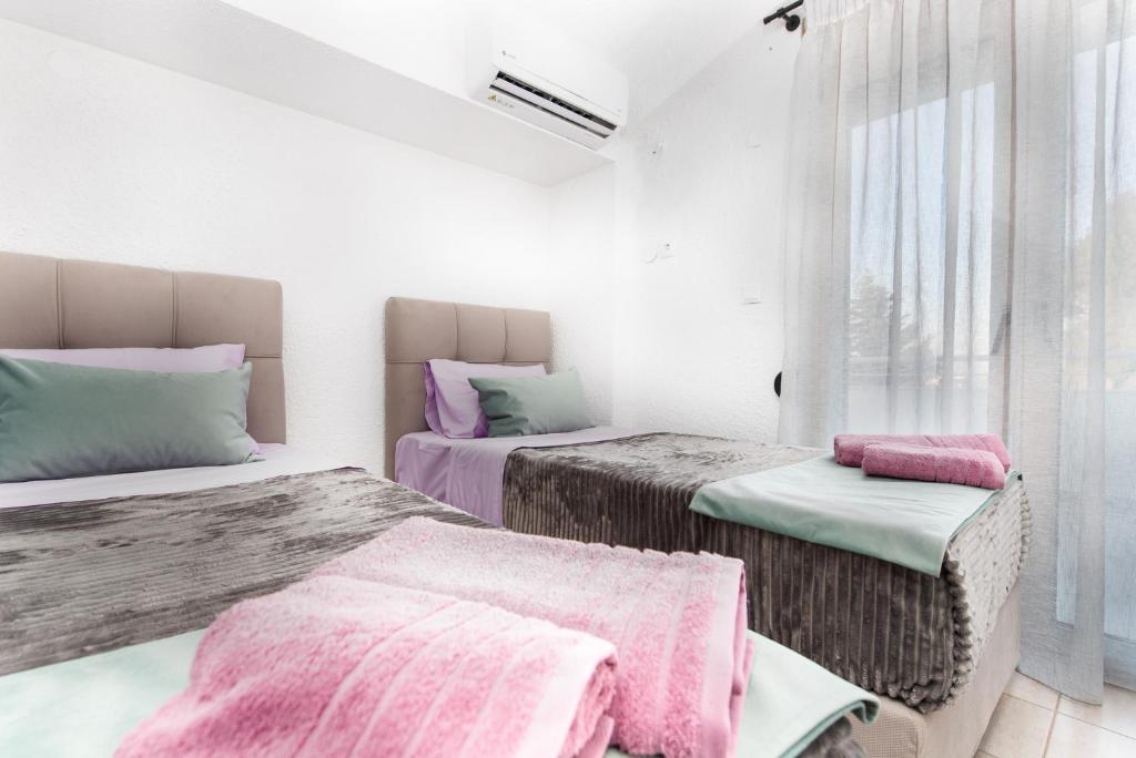 Postel nebo postele na pokoji v ubytování Villa Alex Holiday Home