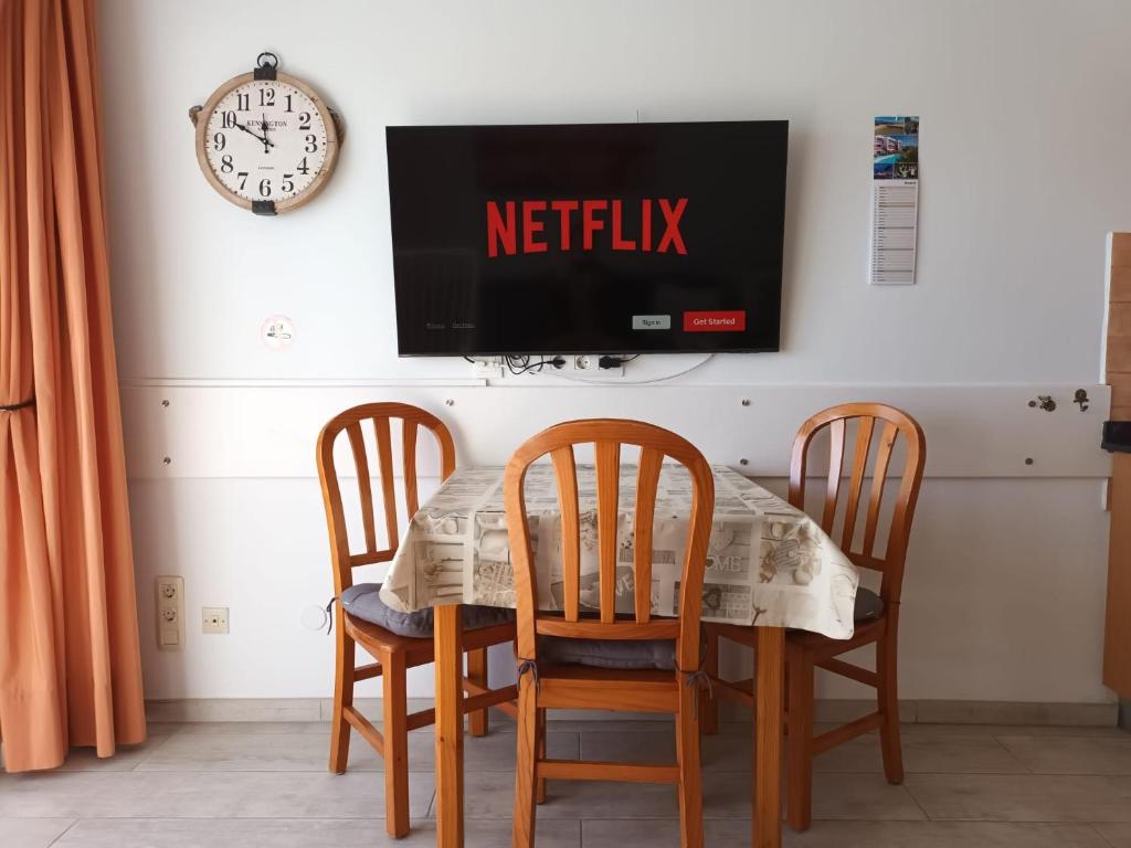 TV a/nebo společenská místnost v ubytování Apartamentos Bogota