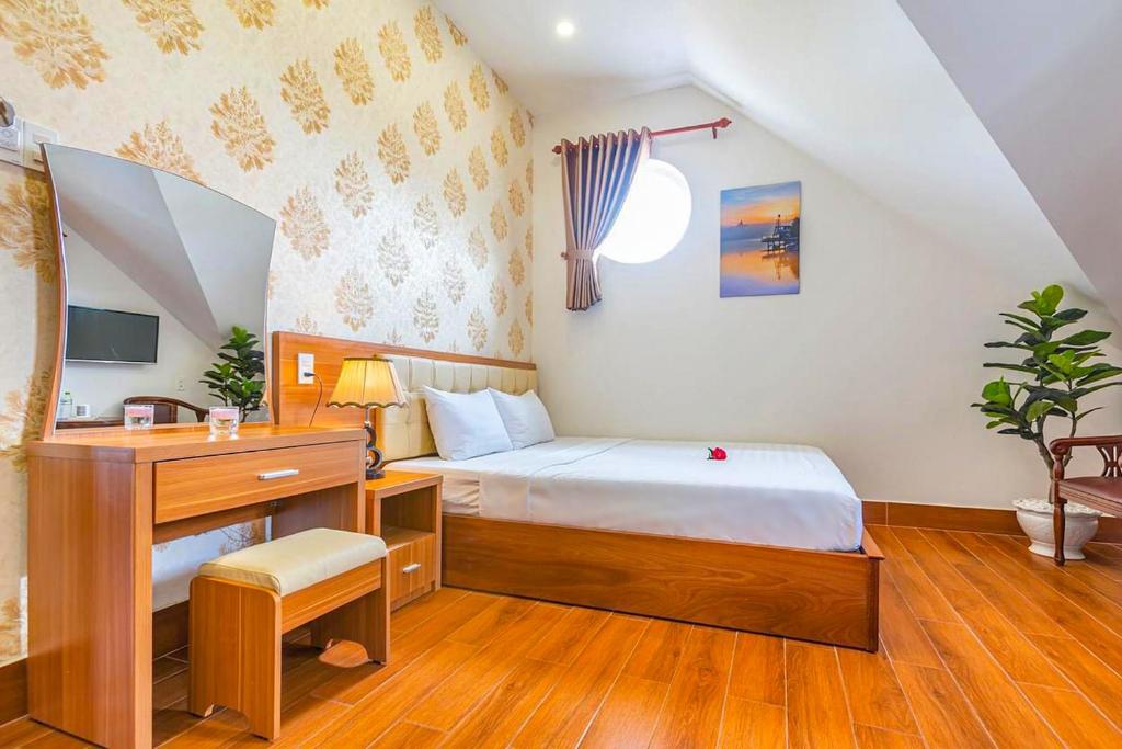 Giường trong phòng chung tại Villa Hoa Ly Đà Lạt