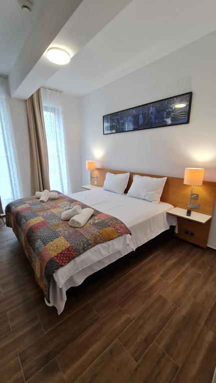 Postel nebo postele na pokoji v ubytování Jafar Resort 3