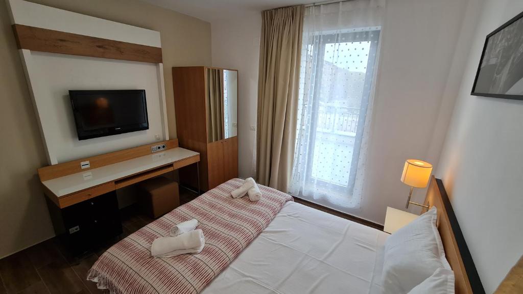 Postel nebo postele na pokoji v ubytování Jafar Resort 3