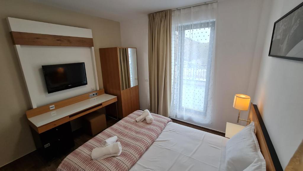 Postel nebo postele na pokoji v ubytování Jafar Resort 3
