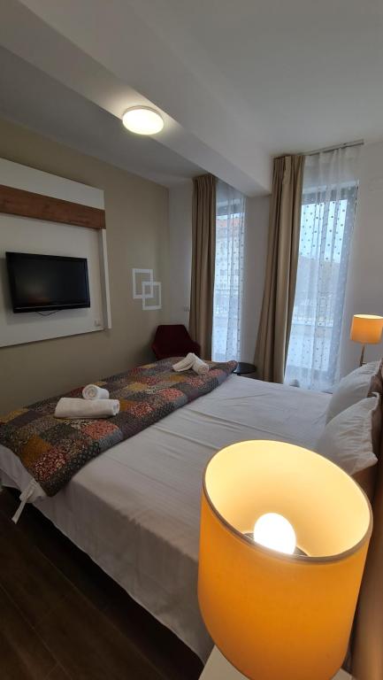 Postel nebo postele na pokoji v ubytování Jafar Resort 3