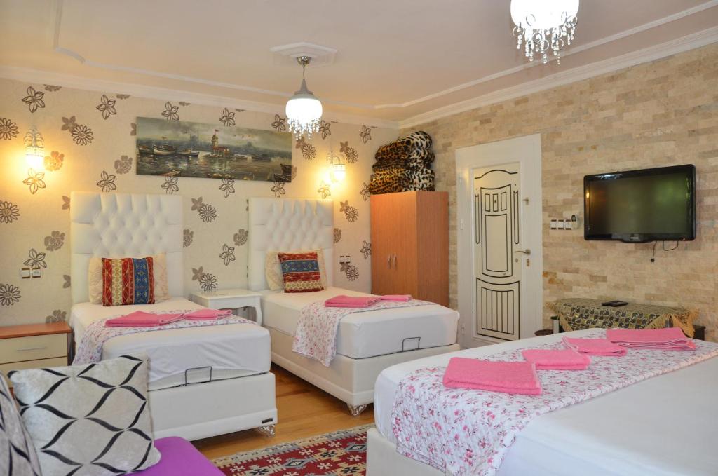 Ένα ή περισσότερα κρεβάτια σε δωμάτιο στο Sinter Terasse House Hotel