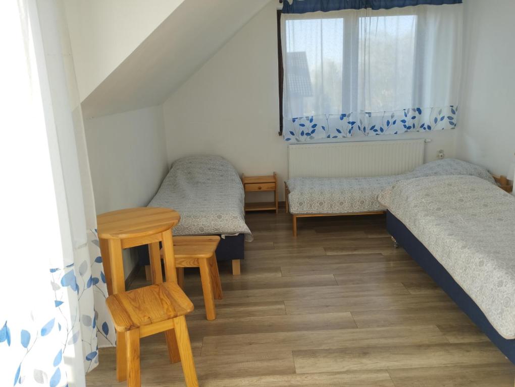 Noclegi Pod Dębem - Double Room With Shared Bathroom