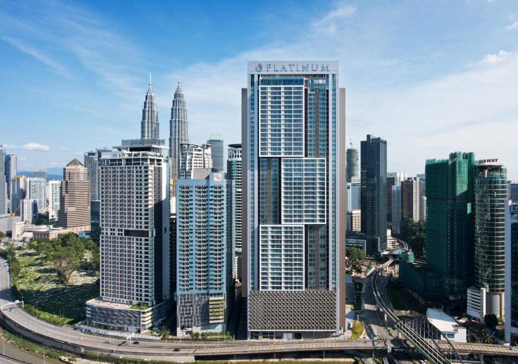 a view of a large city with tall buildings at KLCC Suites at Platinum in Kuala Lumpur