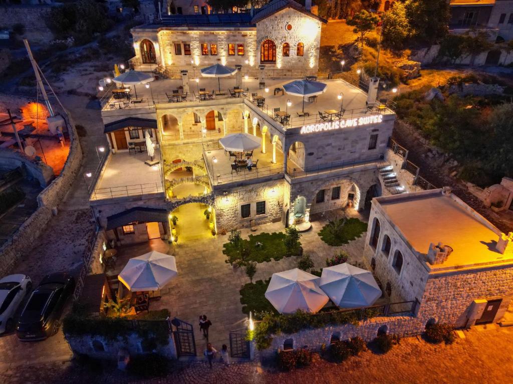 an aerial view of a mansion at night at Acropolis Cave Suite in Urgup