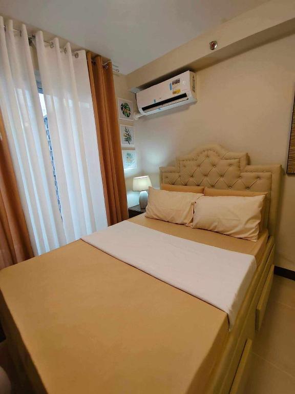 Postel nebo postele na pokoji v ubytování Seo staycation