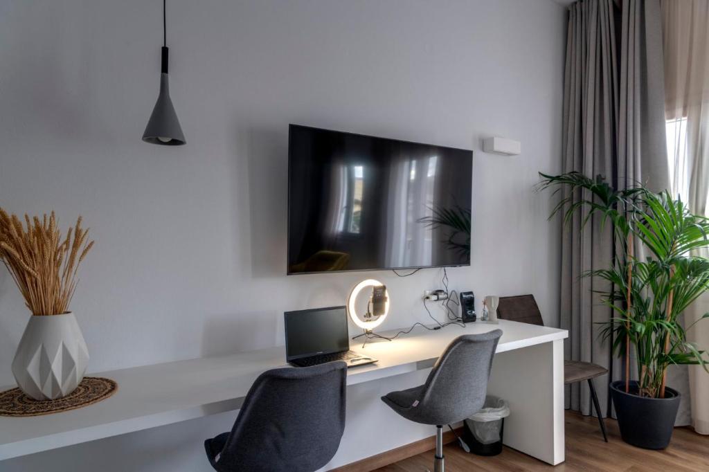 TV a/nebo společenská místnost v ubytování Marion Suite