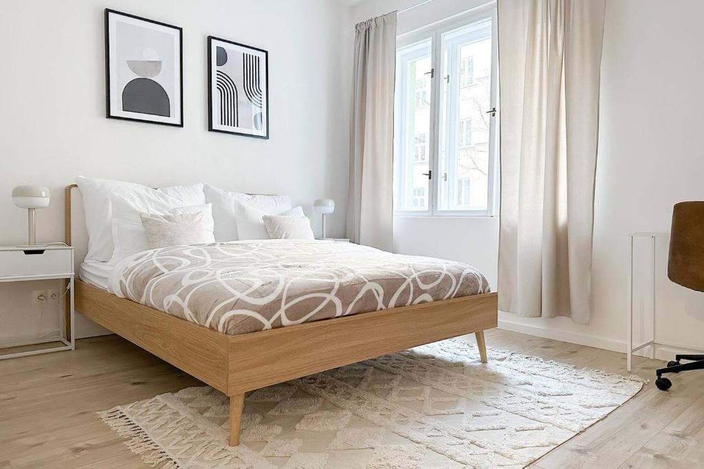 Cama o camas de una habitación en Elegant And Cozy 2kk Apartment