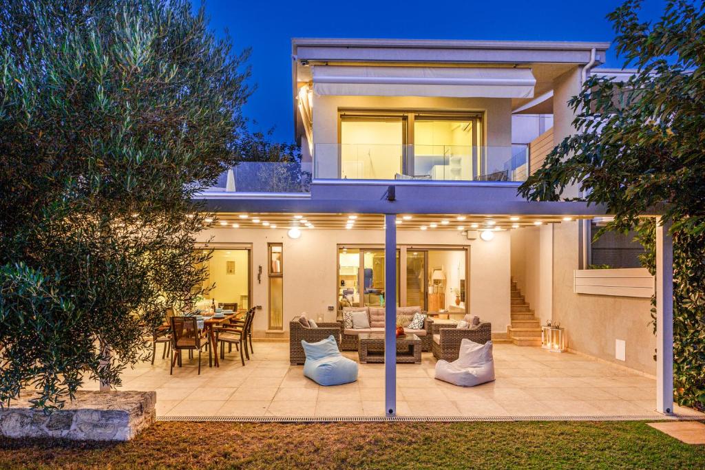 Posedenie v ubytovaní A&A Luxury Beach Villas