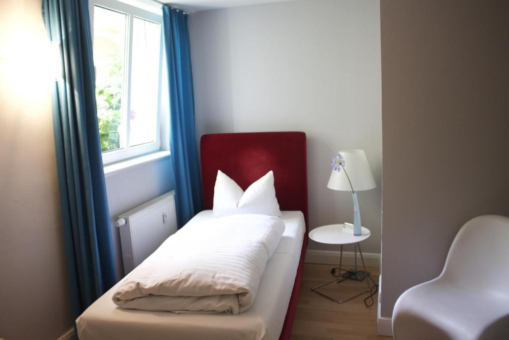 Postel nebo postele na pokoji v ubytování Schlaflounge
