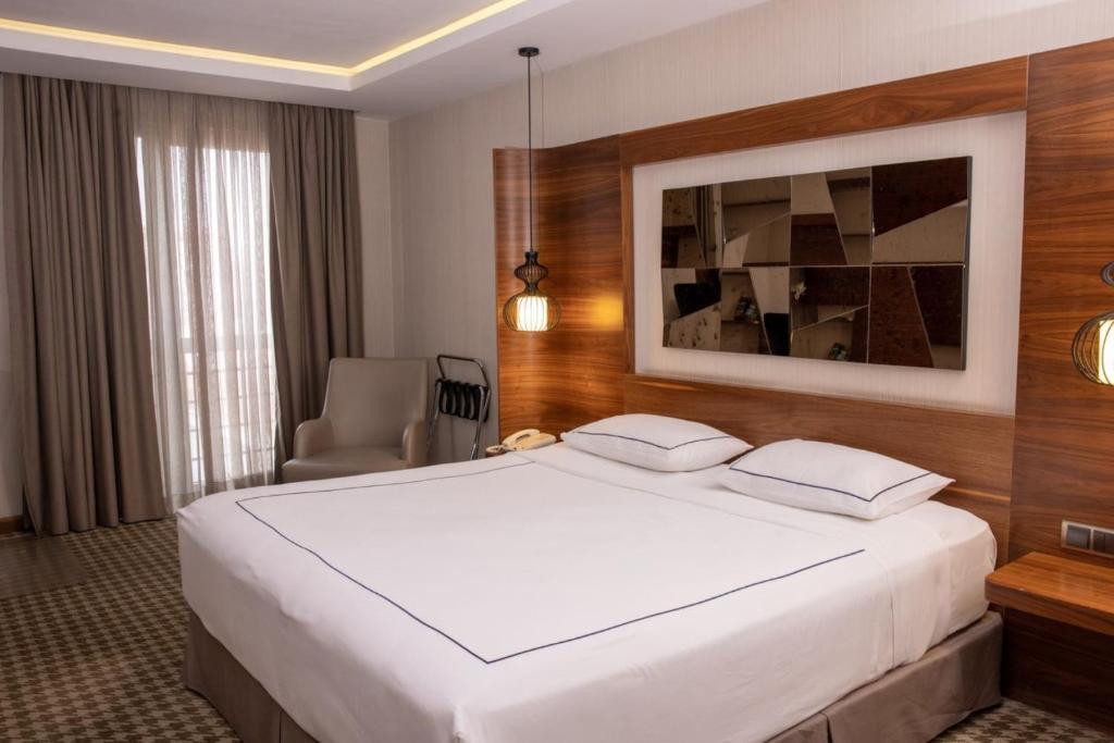 Postel nebo postele na pokoji v ubytování Anemon Kent Ankara Otel
