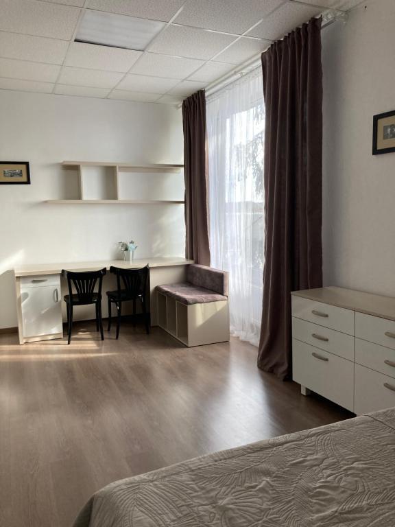 Postel nebo postele na pokoji v ubytování Green Kitchen Apartments