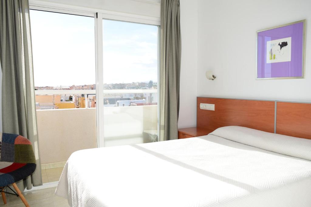 Posteľ alebo postele v izbe v ubytovaní Hotel Mirablau