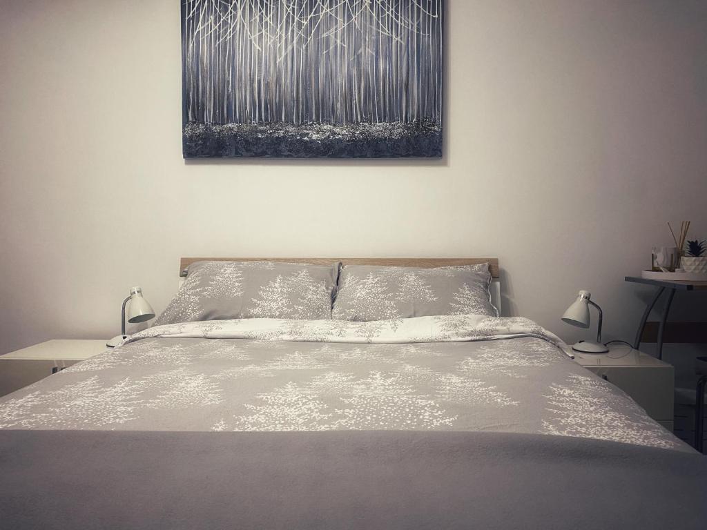 מיטה או מיטות בחדר ב-ASTORIA