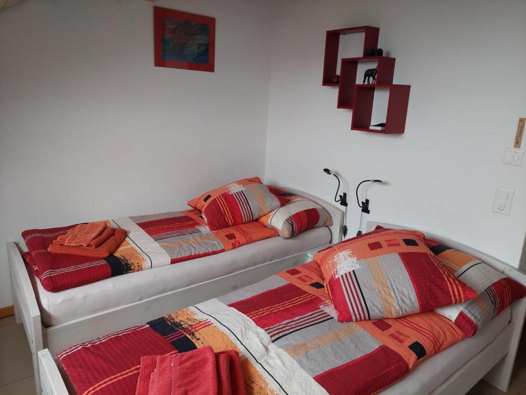 Postel nebo postele na pokoji v ubytování BNB Les Prises