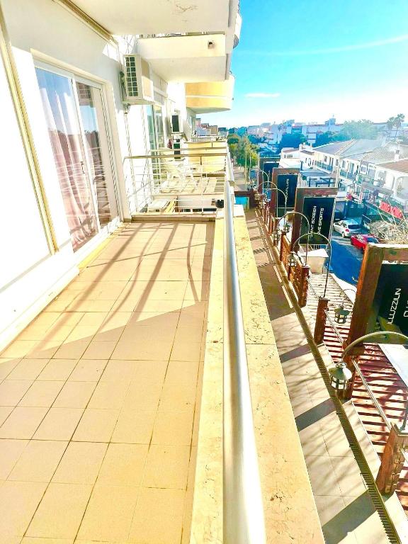 a balcony of a house with a view of a harbor at Flat Luxuoso Praia da Oura in Albufeira