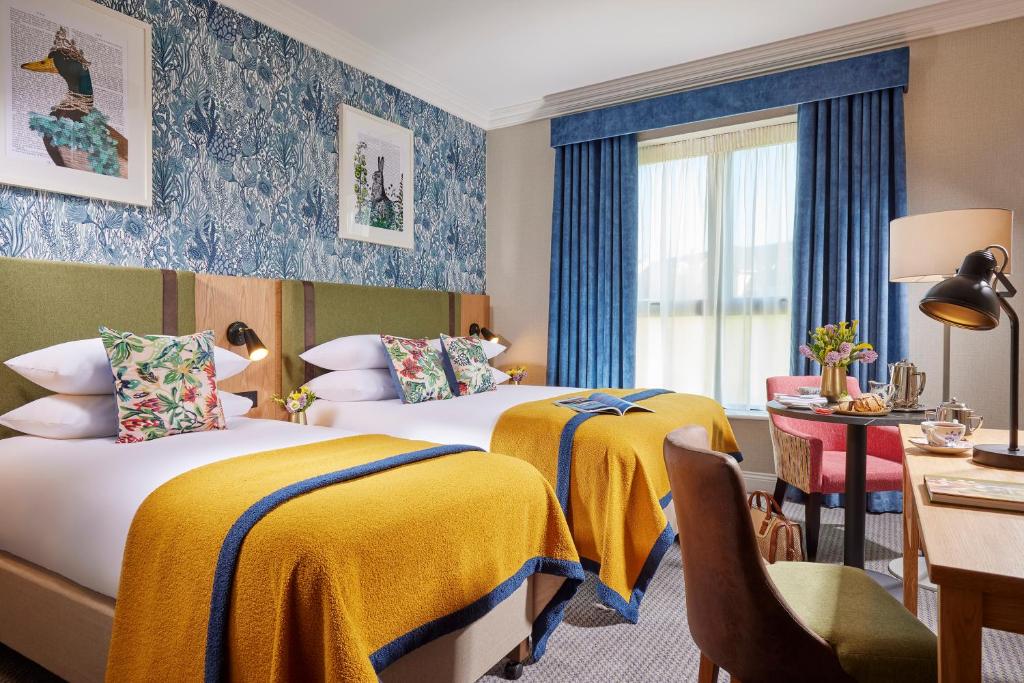 Postel nebo postele na pokoji v ubytování Clonakilty Park Hotel