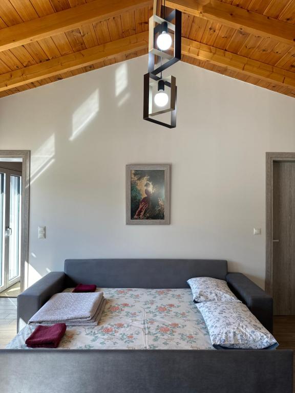 Postel nebo postele na pokoji v ubytování EVIA RIVIERA
