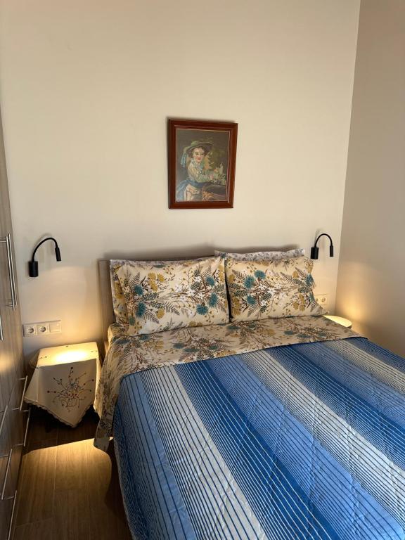Postel nebo postele na pokoji v ubytování EVIA RIVIERA