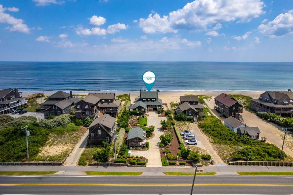 an aerial view of a house with a water tower at NH315 Serenity by the Sea in Nags Head