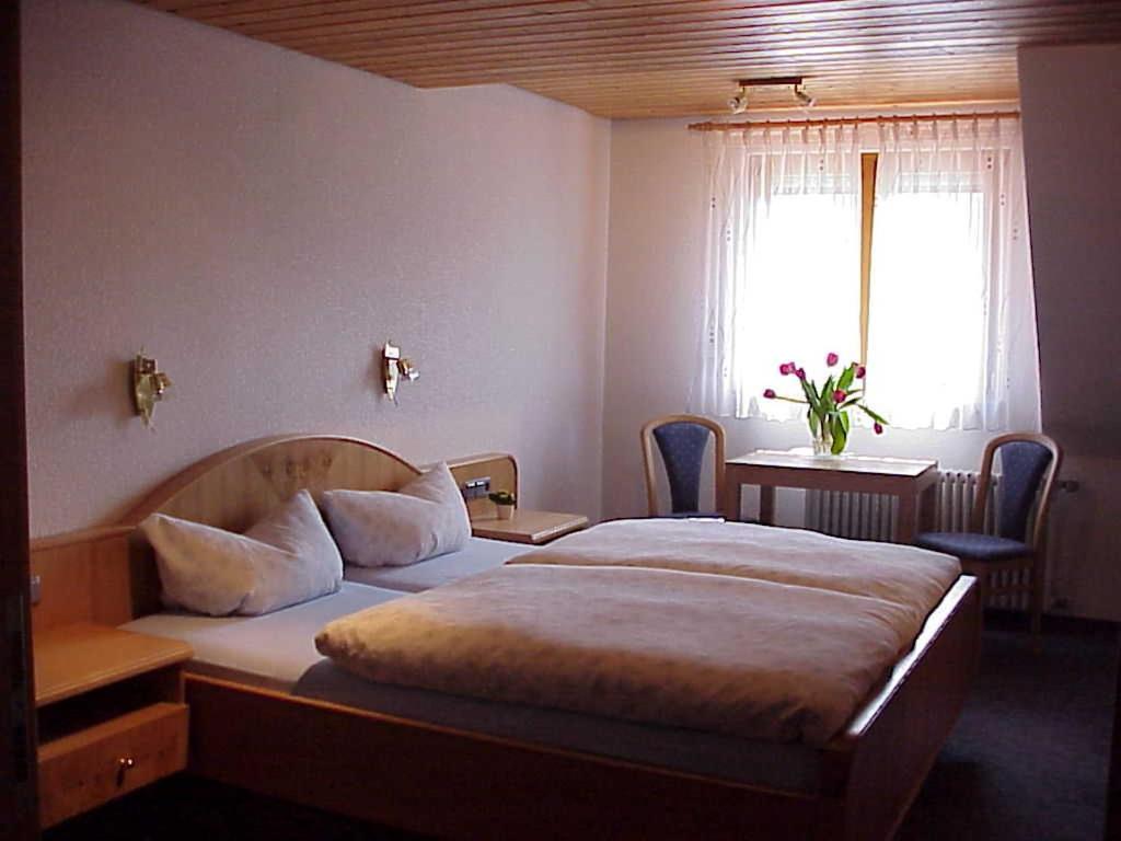 Postel nebo postele na pokoji v ubytování Mosertonihof