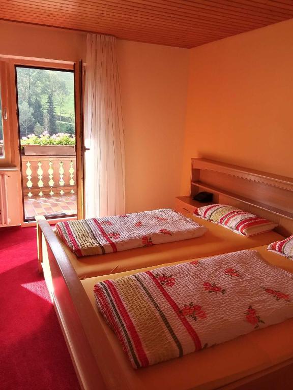 Postel nebo postele na pokoji v ubytování Mosertonihof