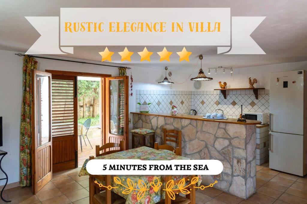 minutes from the sea in the kitchen of a house at [Eleganza Rustica In Villa] A 5 minuti dal mare in Tonnara di Bonagia