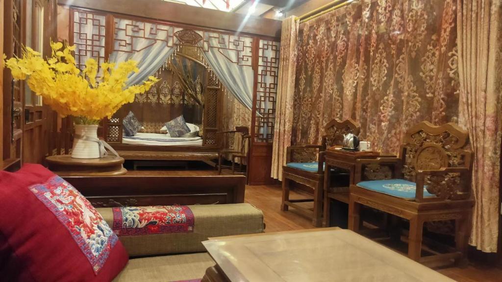 Posezení v ubytování Pingyao HongJingYuanGuesthouse