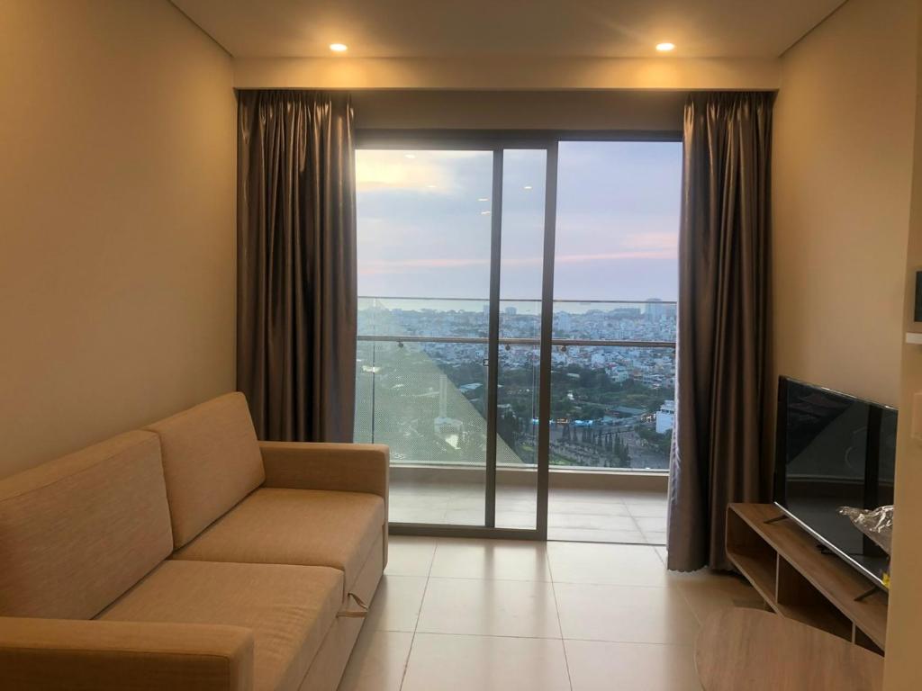 TV a/nebo společenská místnost v ubytování The Song Apartment Vung Tau Sea view