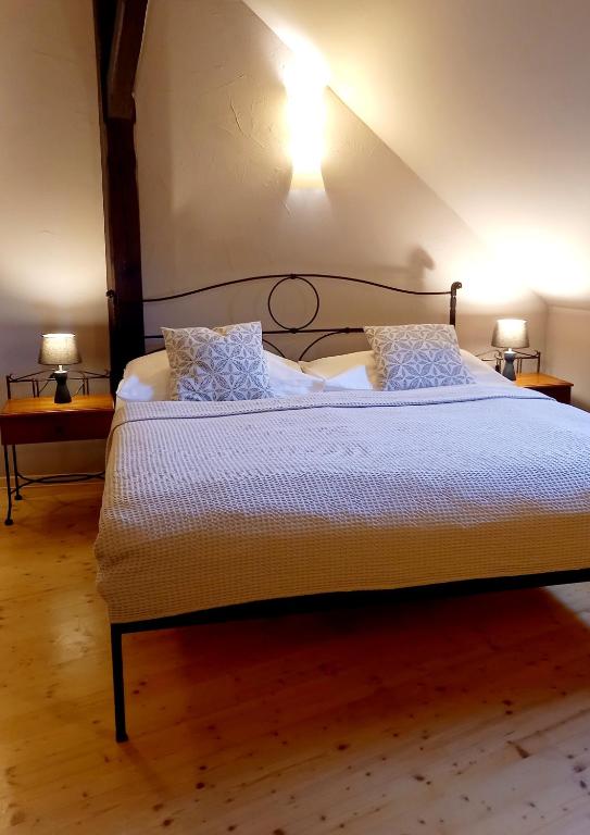 Postel nebo postele na pokoji v ubytování Boutique Hotel Templ