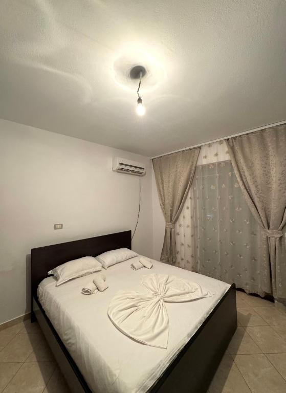 Postel nebo postele na pokoji v ubytování Melita Apartments