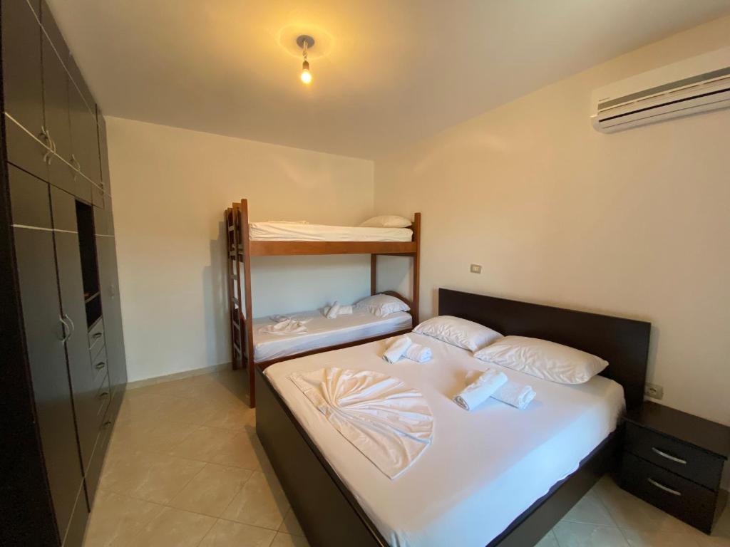 Postel nebo postele na pokoji v ubytování Melita Apartments