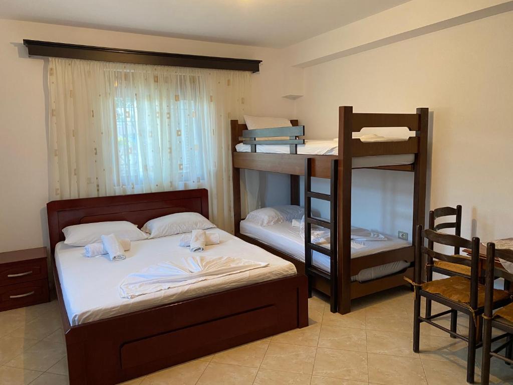 Postel nebo postele na pokoji v ubytování Melita Apartments