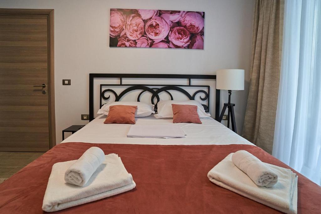 En eller flere senge i et værelse på Bianca Residence 3 by Alz