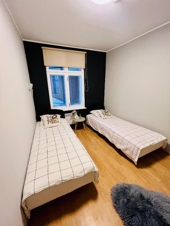 Postel nebo postele na pokoji v ubytování Edgari Guesthouse