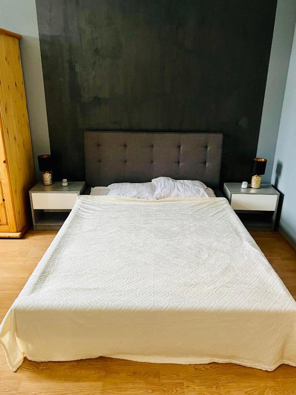 Postel nebo postele na pokoji v ubytování Edgari Guesthouse