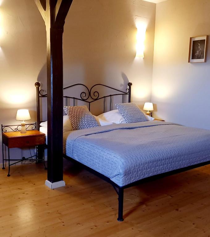 Postel nebo postele na pokoji v ubytování Boutique Hotel Templ