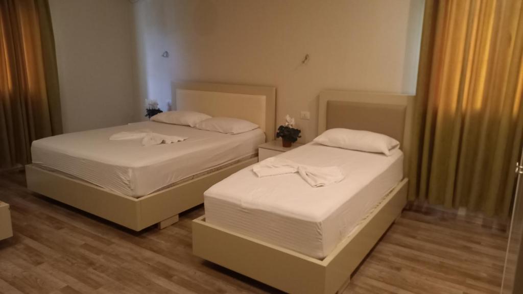 מיטה או מיטות בחדר ב-Veal Hotel and Restaurant