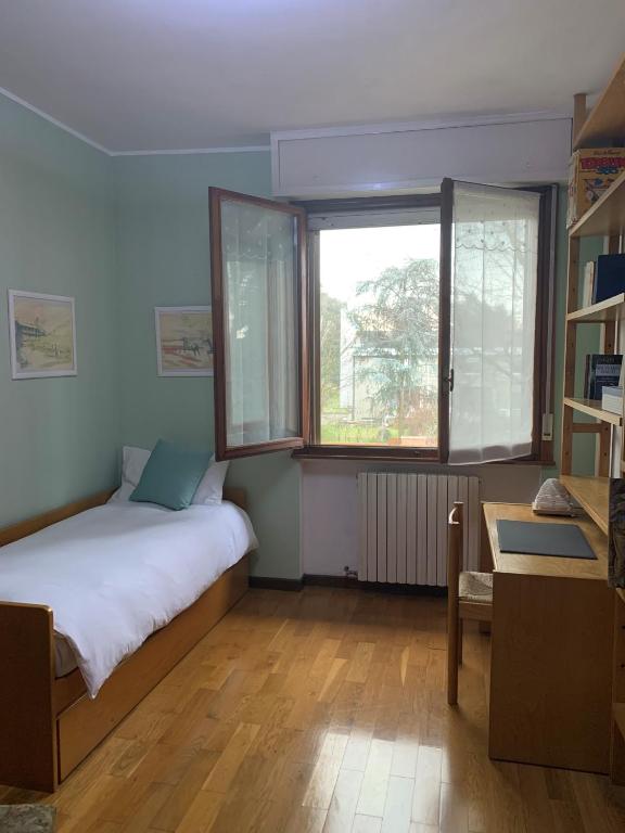 Postel nebo postele na pokoji v ubytování Casa Carlotta - Milan Expo